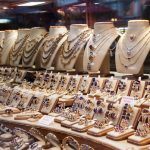 counter-with-variety-of-jewelry-in-store-window