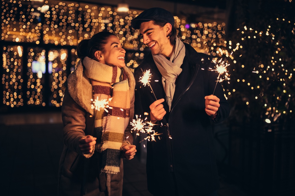 A couple celebrating a New Year's Wedding Proposal